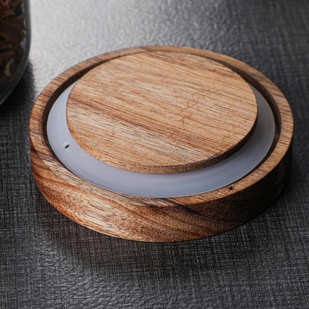 Glass food storage jar with wooden lid