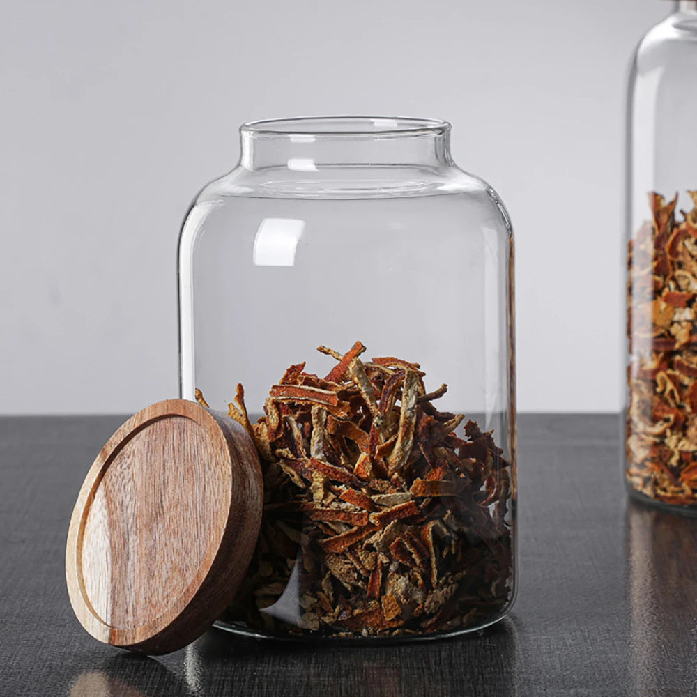 Glass food storage jar with wooden lid