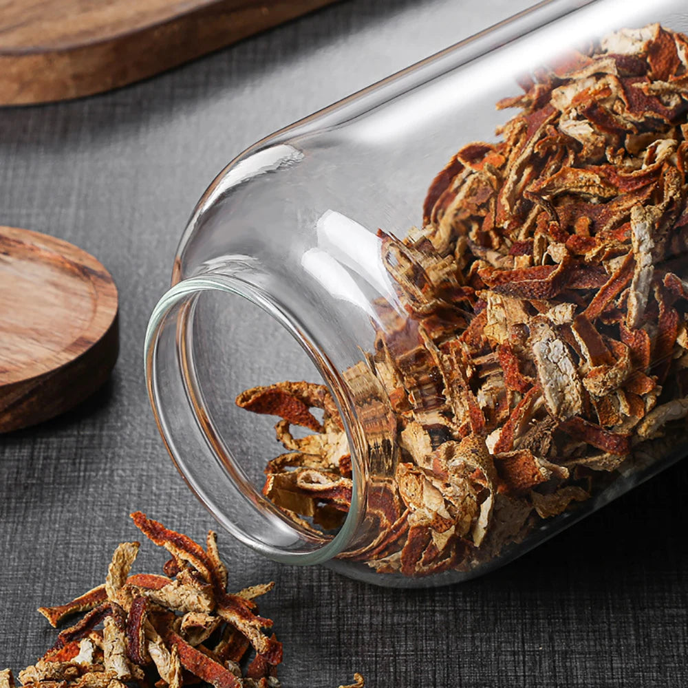 Glass food storage jar with wooden lid