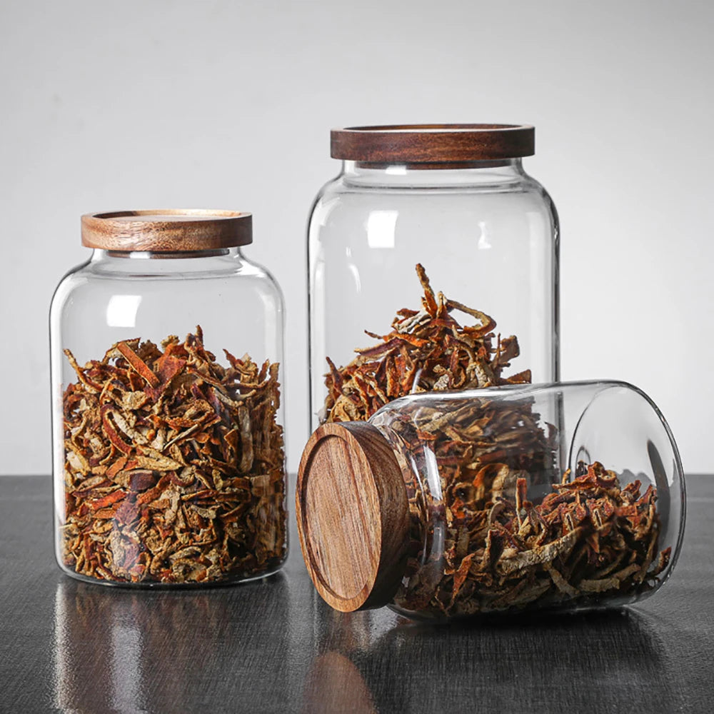 Glass food storage jar with wooden lid