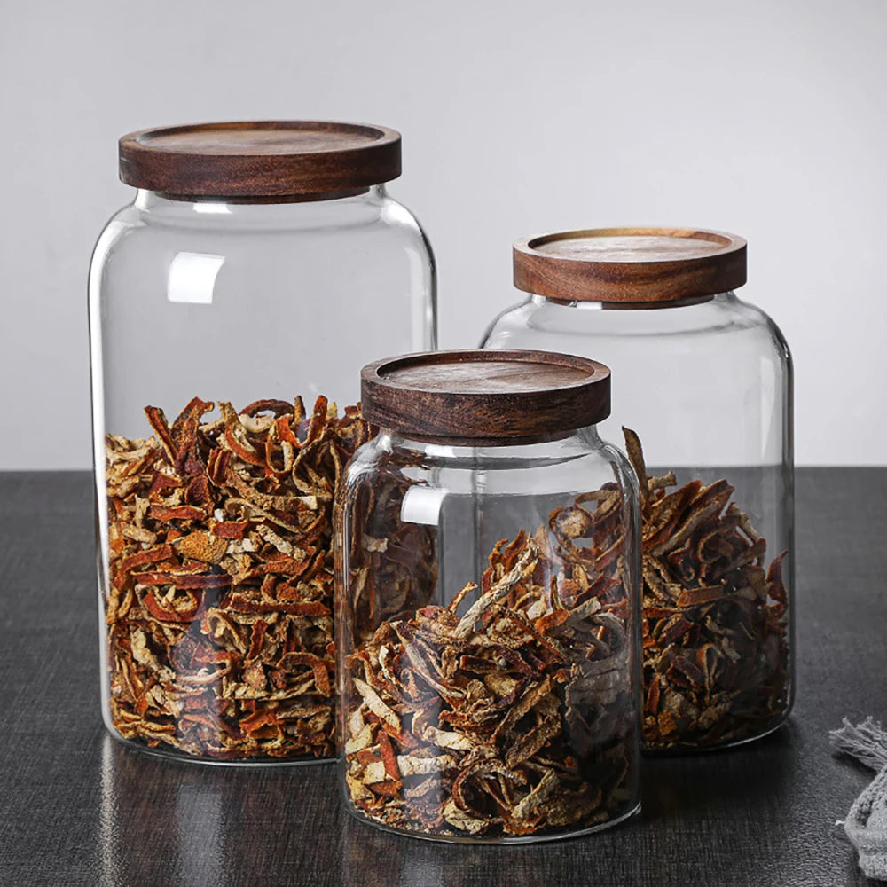 Glass food storage jar with wooden lid